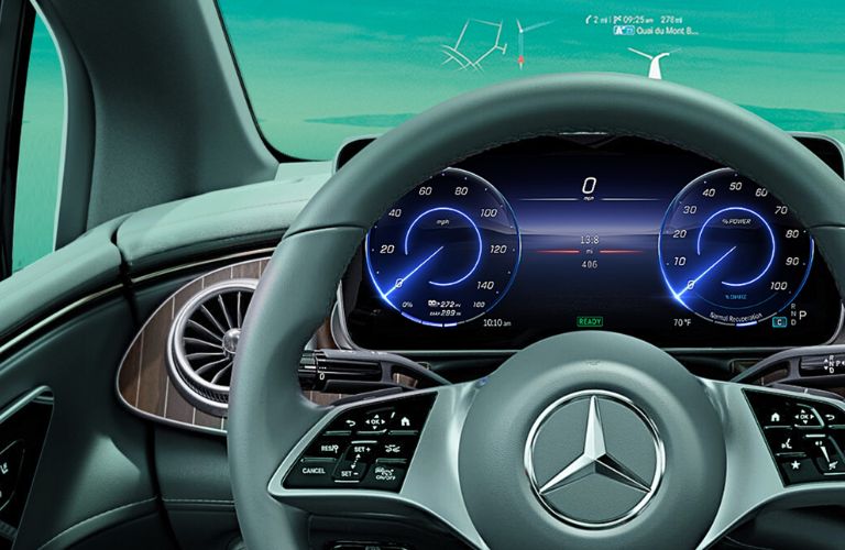 The steering wheel of the 2023 Mercedes-Benz EQE is shown.